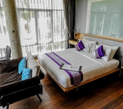 Двухместный полулюкс с видом на сад двуспальная кровать в Vartika Resovilla KuiBuri Beach Resort and Villas