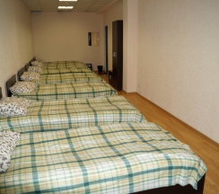 Кровать в общем номере в Натали