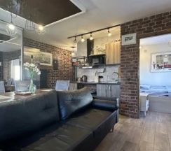 Апартаменты c 1 комнатой с балконом и с видом на город в Квартира в центре Loft