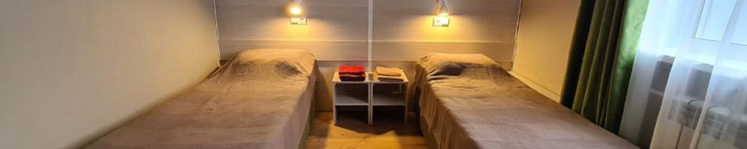 Кровать в 2-местном общем номере в Юбилейный