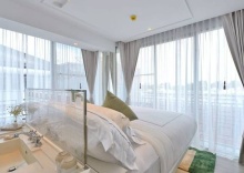 Номер Deluxe с балконом в Riva Arun Bangkok