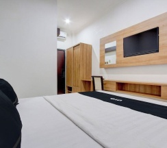 Двухместный номер Deluxe двуспальная кровать в Capital O 93266 Palmier Hotel