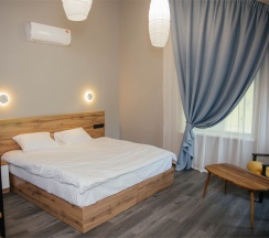 Двухуровневый Джуниор Сюит на втором этаже со своей зоной отдыха в Игуана