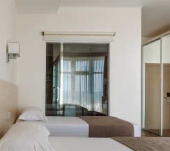 Стандартный четырехместный номер с фрагментарным видом на море в Del Mar Inn