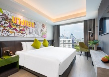 Номер Deluxe в Maitria Rama 9 Bangkok - A Chatrium Collection Hotel