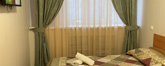 1 двуспальная кровать в Лососинская