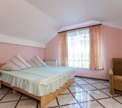 Четырёхместный номер Standard с 2 комнатами с красивым видом из окна в Гостевой дом