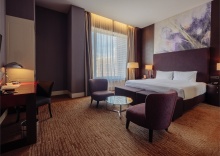 номер ДЕЛЮКС с 1 двуспальной кроватью в Doubletree by Hilton Moscow-Marina