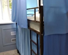 Кровать в 4-местном общем мужском номере в RussLand