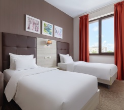 Стандартный двухместный номер с 2 отдельными кроватями в Golden Tulip