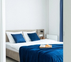 Номер Superior в Квартира на сутки Минск Маяк Метро 3 минуты Бесконтактное заселение Wi-Fi Кухня объединена с жилой зоной Отдельная спальня