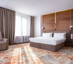 Двухместный люкс с видом на горы двуспальная кровать в GRAND MILDOM HOTEL