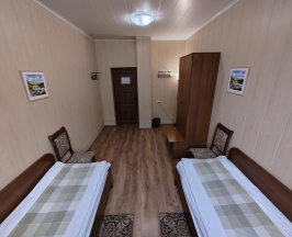 Кровать в 2-местном общем мужском номере в Корона