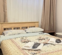 Стандартный двухместный номер c двуспальной кроватью и собственной ванной комнатой. в Kovensky