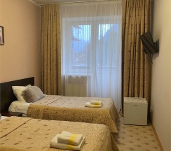 Номер стандарт с 2 односпальными кроватями в Снежный Барс