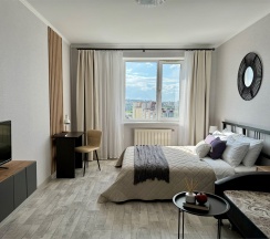 Апартаменты с панорамным видом на 16 этаже в Призма