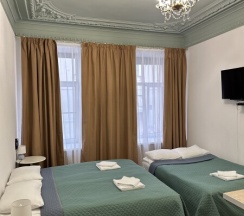 Четырёхместная комната с собственной мини - кухней для 4 взрослых / Quadruple room with private kitchenette в Pio