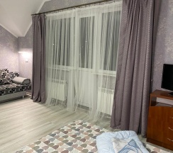 Четырёхместный номер Standard с балконом в Дюна-центр