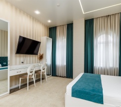 Люкс с кроватью размера «king-size» в Чеховъ