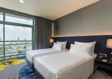 Двухместный клубный номер Standard с видом на город двуспальная кровать в Chatrium Hotel Riverside Bangkok