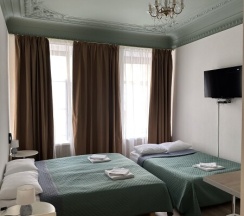 Четырёхместная комната с собственной мини - кухней для 4 взрослых / Quadruple room with private kitchenette в Pio