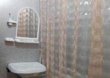 Кровать в 4-местном общем мужском номере в Сибпромстрой