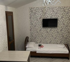 Номер студия семейный (мансарда) в Лиана