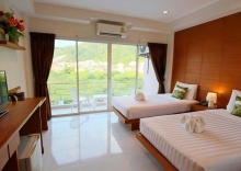 Четырёхместный номер Deluxe в Good Nice Hotel Patong