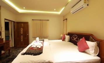 Четырёхместный семейный номер Standard с красивым видом из окна в The Siam Residence Boutique Resort