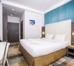 Делюкс с кроватью KING SIZE для 2 гостей в Мио