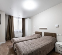 1-комнатные апартаменты стандарт с 2 односпальными кроватями в Home Like (Хоум Лайк) на бульваре Эйнштейна 3