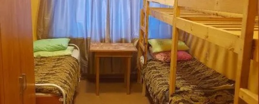 Кровать в общем номере в Хостел