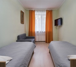 Стандарт с одной двуспальной или двумя раздельными кроватями с удобствами на этаже в Салют