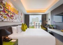 Номер Deluxe в Maitria Rama 9 Bangkok - A Chatrium Collection Hotel