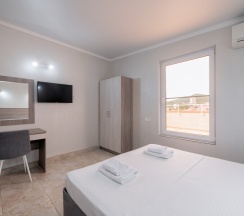 Апартаменты Люкс (с кухней и террасой с видом на море и горы) в Эллада