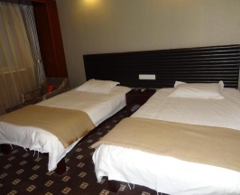 Двухместный номер Standard 2 отдельные кровати в Huilong Tower Hotel