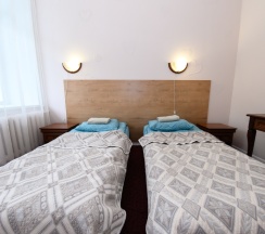 Двухместный номер Семейный Эконом 2 отдельные кровати в Вкс