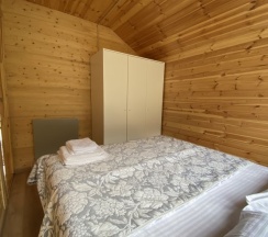 Двухместное шале Classic с красивым видом из окна двуспальная кровать в Arkhyz family lodge