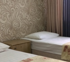 Односпальная кровать в общем номере с 2 кроватями (номер первой категории) в Патио