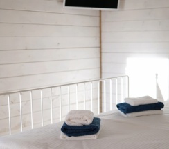 Двухместный коттедж двуспальная кровать в Четыре сезона