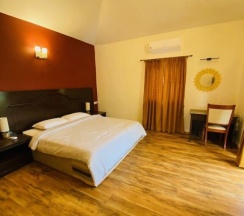 Двухместная вилла двуспальная кровать в Indismart Woodbourne Resort