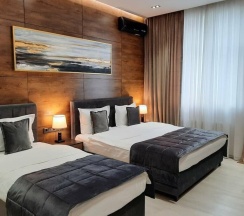 Двухместный номер Deluxe 2 отдельные кровати в Home Hotel