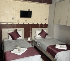 Четырёхместный номер Standard в Ersoy Ağa Otel Pansi̇yon