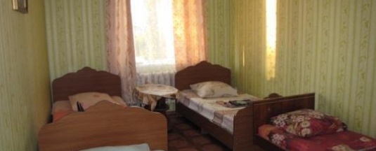 Кровать в 5-местном общем номере в Юнона