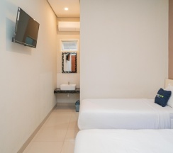 Двухместный номер Superior 2 отдельные кровати в Urbanview Hotel Bubusini Batu by RedDoorz