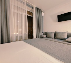 Четырёхместный номер Superior с балконом и рядом с пляжем в Casa mare