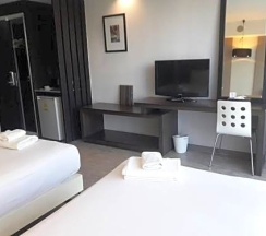 Двухместный номер Deluxe 2 отдельные кровати в Inn Place Serviced Residence