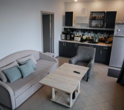 Двухместный коттедж с 3 комнатами с красивым видом из окна двуспальная кровать в Банный остров