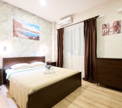 Двухместный номер с большой двуспальной кроватью СТАНДАРТ ПЛЮС в Морской