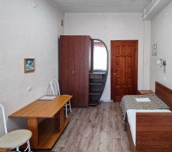 Кровать в 3-местном общем номере в Smart Hotel KDO Миасс